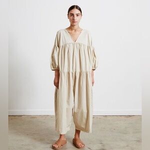 Black crane oversized puff jumpsuit in light clay color